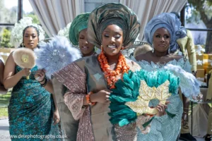 Bride smiling as she approaches the groom