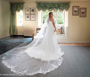 Bride standing in a beautiful white gown
