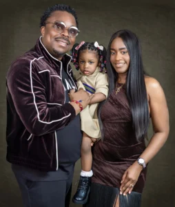 Man standing with his family