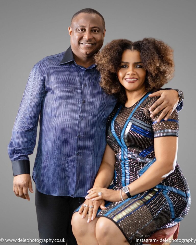 A happy man and woman taking a honeymoon photoshoot