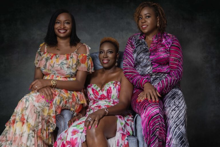 3 women seating on the couch