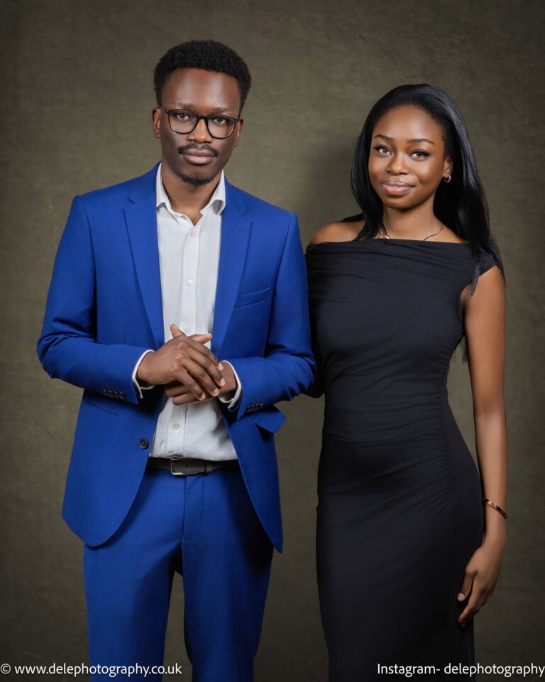 young couple standing and holding hands